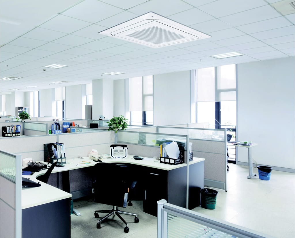 A ceiling cassette air Conditioning Unit in a commercial office